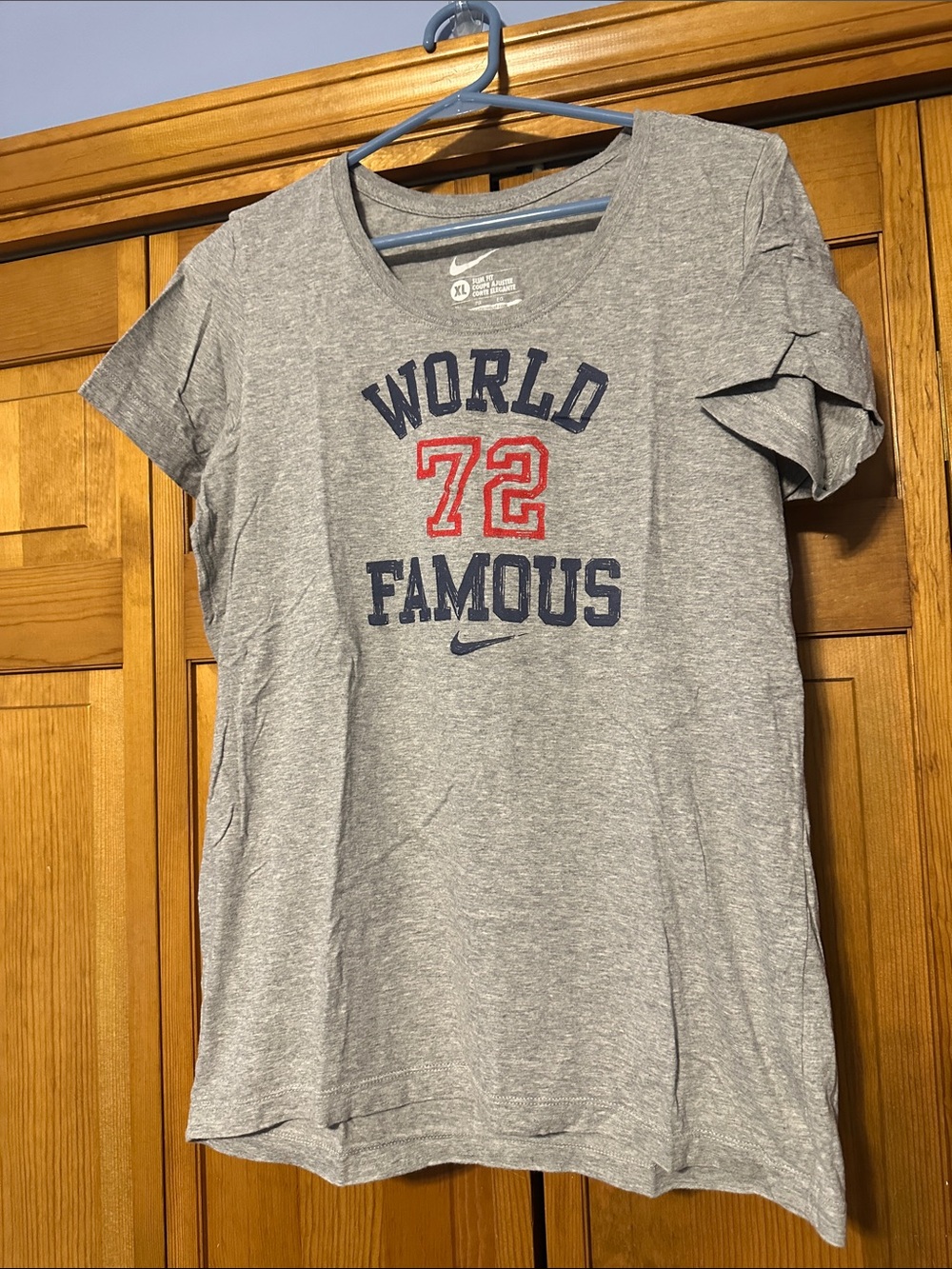Nike Women’s Gray Graphic Tee with Navy & Red Accents
